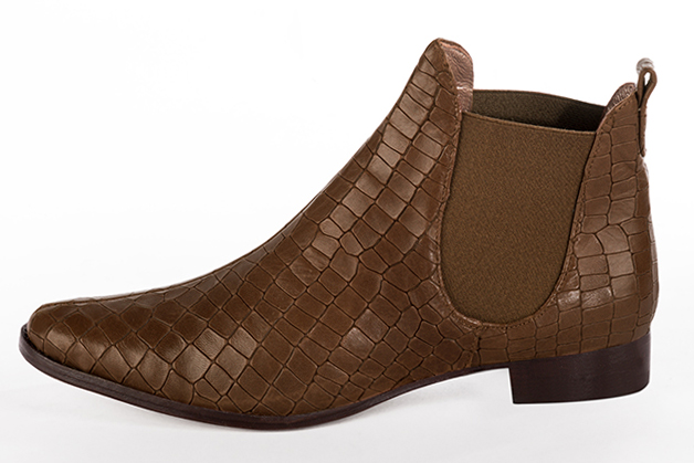 Caramel brown women's ankle boots with buckles. Round toe. Flat leather soles. Profile view - Florence KOOIJMAN
